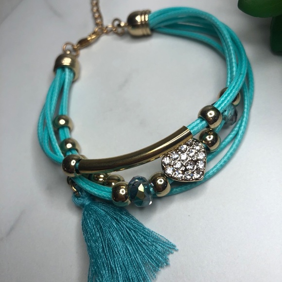 Beautiful teal banded bracelet with jeweled heart - Picture 4 of 11